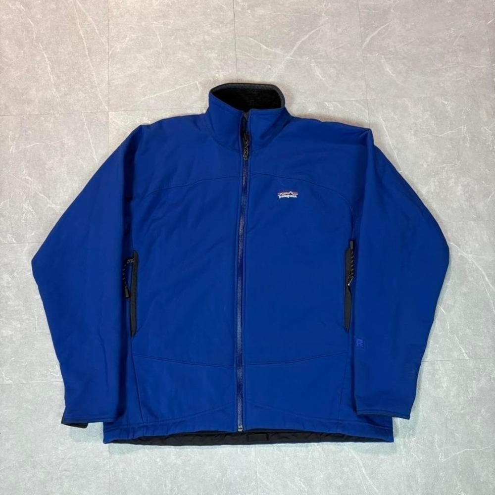 Early 2000's Patagonia blue fleeced lined rain defender jacket